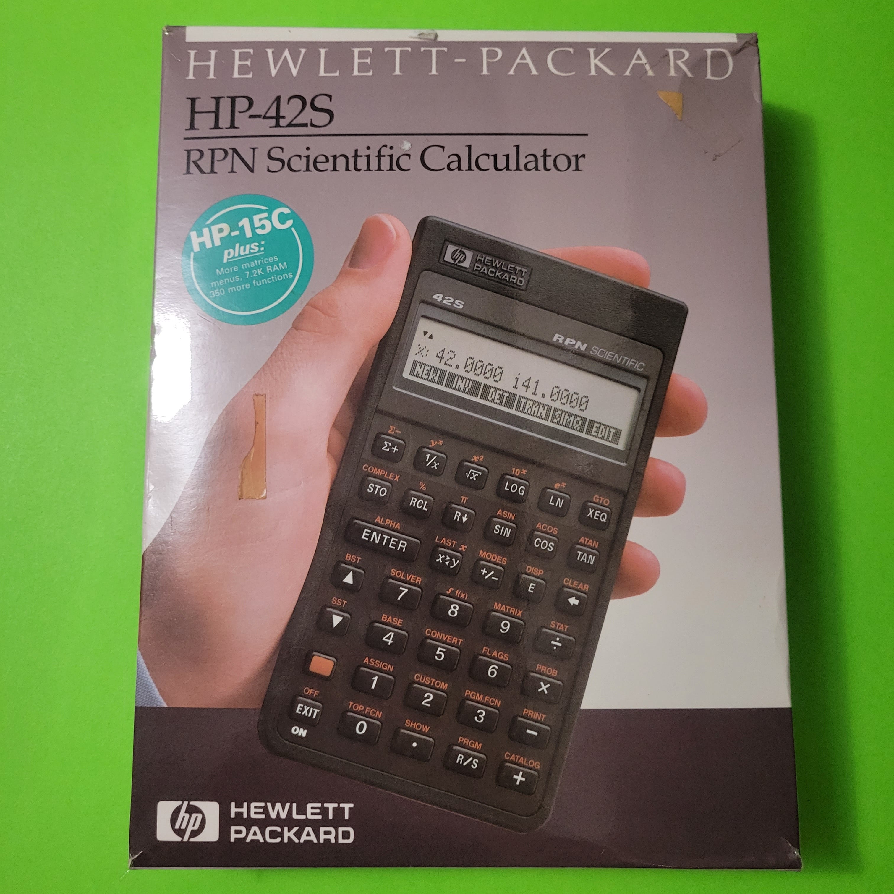 An image of the front of the box of a HP 42s RPN Scientific Calculator